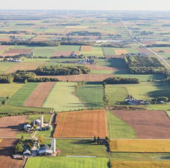 An aerial few of agricultural land extending past the horizon underscores how big a task monitoring Illinois farm safety will be.
                  